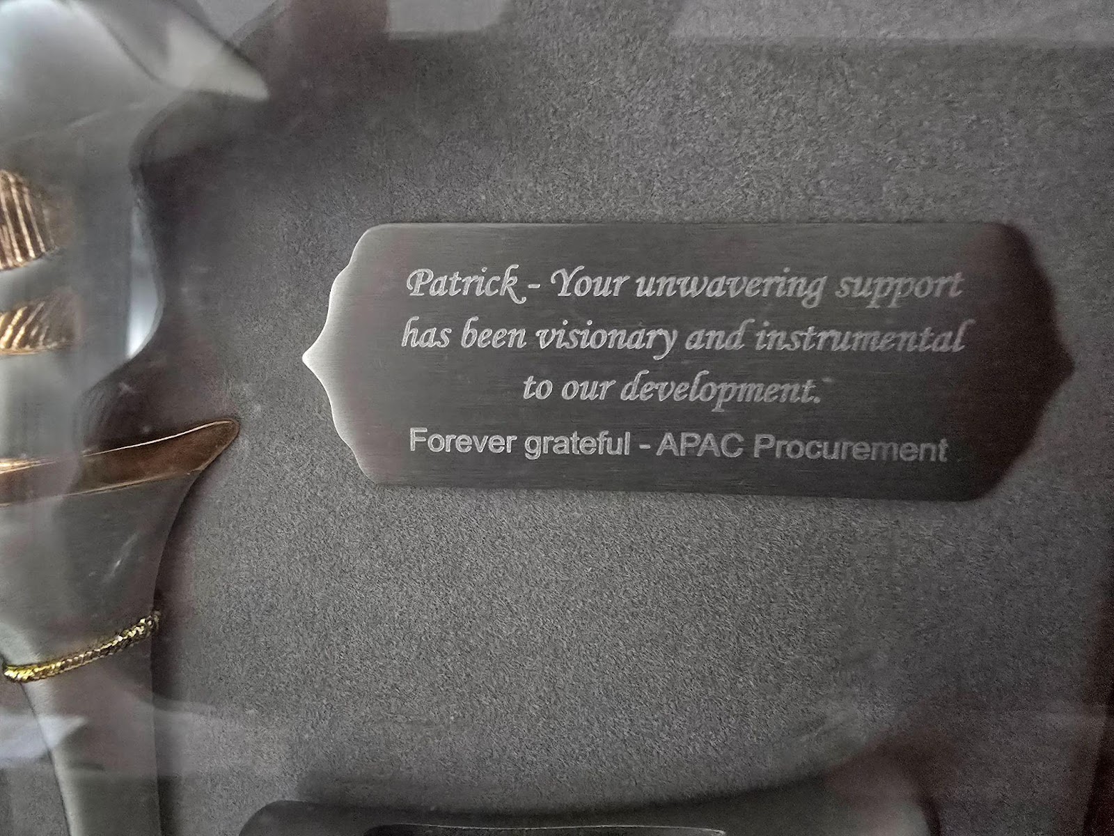 Commemorative plaque recognizing Patrick for his visionary leadership and instrumental support in the development of APAC Procurement.