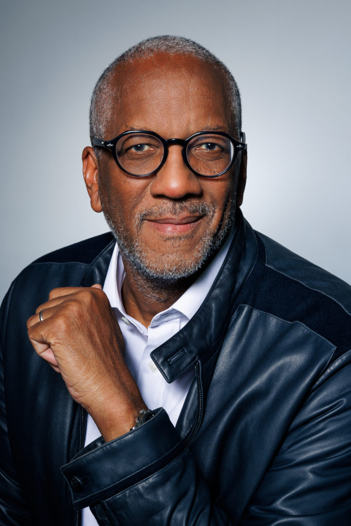 Professional portrait of Patrick Franchinard in business attire.